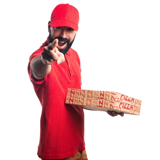 Foto grátis homem de entrega de pizza apontando para a frente