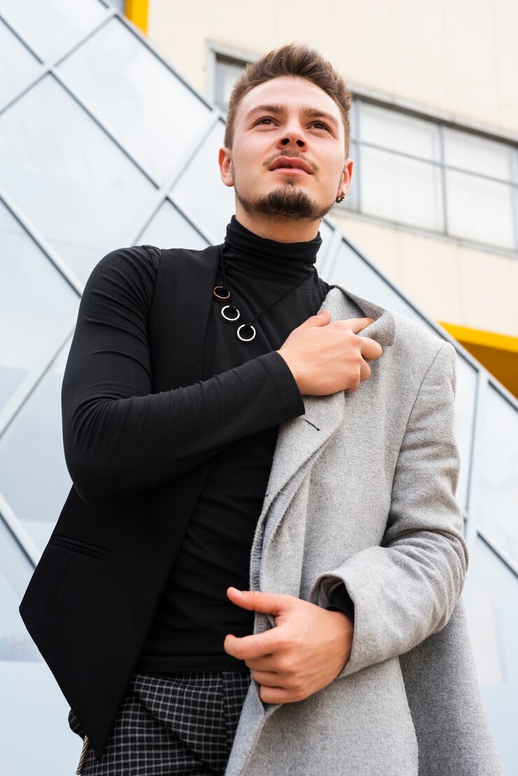 Foto grátis homem elegante, olhando longe da câmera