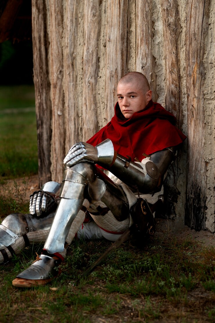 Foto grátis homem em foto posando como um soldado medieval
