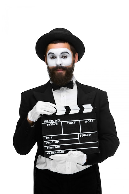 Foto grátis homem na imagem mime com placa de filme