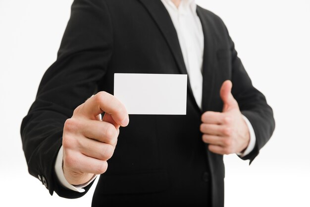 Homem negócios, apresentando, cartão negócio, com, polegares cima