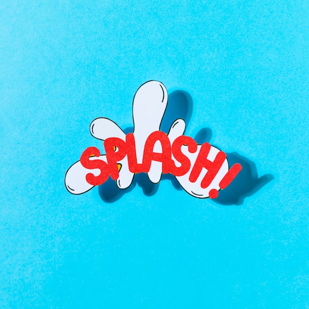 Foto grátis ilustração de arte pop de texto splash e ícone de vetor de efeito contra o fundo azul