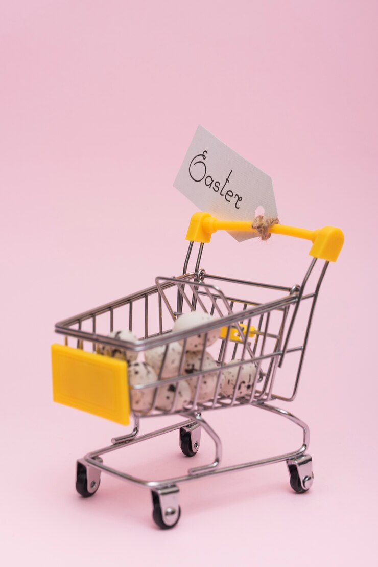 Foto grátis inscrição de páscoa com ovos no carrinho de supermercado