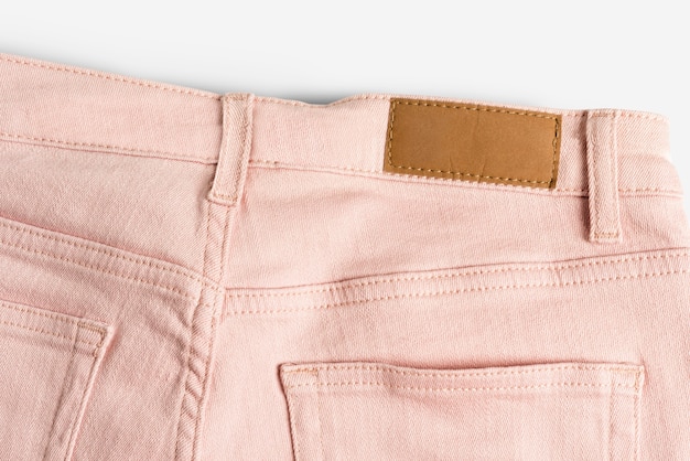 Foto grátis jeans rosa com marca de roupas em branco - moda casual