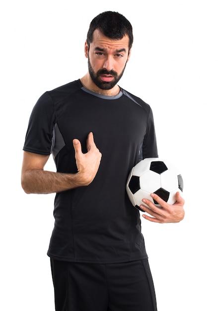 Foto grátis jogador de futebol cansado