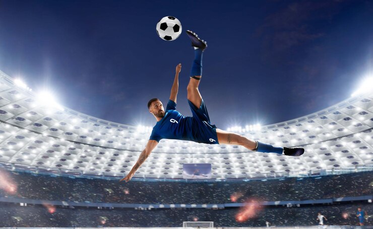 Foto grátis jogadores de futebol em ação no estádio profissional