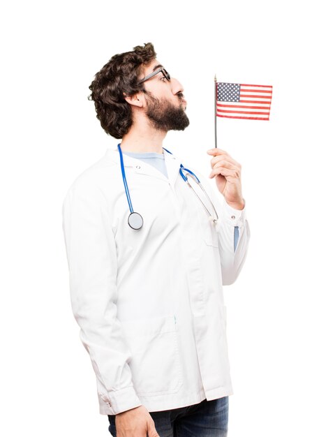 Jovem doutor com uma bandeira