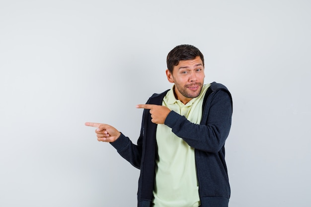 Jovem expressivo posando no estúdio