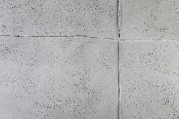 Junção de parede branca com textura áspera