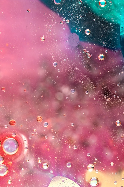 Foto grátis lindo fundo colorido brilhante com gotas de óleo