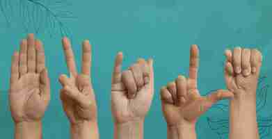 Foto grátis língua gestual com as mãos no estúdio