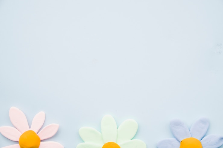 Foto grátis linha de argila flor colorida em fundo cinza