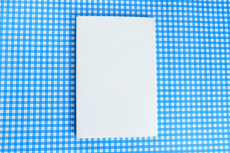 Foto grátis livro de papel físico sobre o plano de fundo