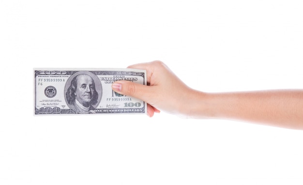 Mão da mulher com os dólares isolados no fundo branco