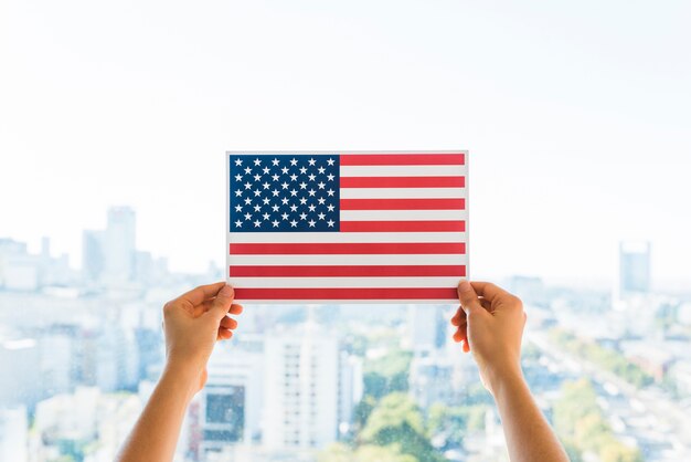 Mãos, segurando, bandeira, de, américa