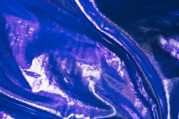 Material brilhante abstrato azul no fundo