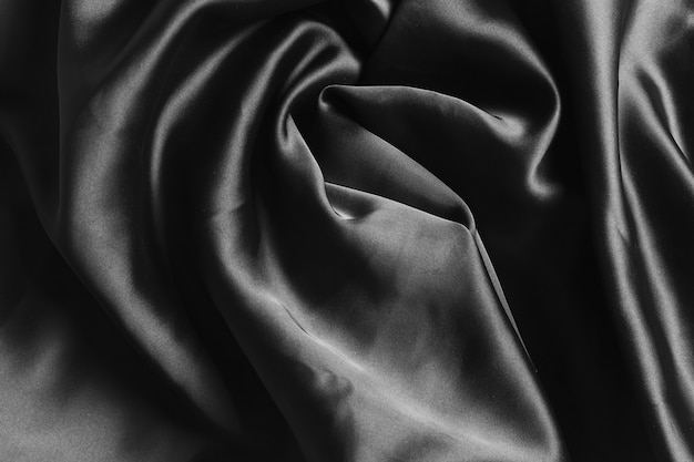 Material de tecido de seda preto curvilíneo