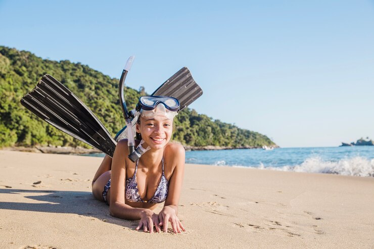 Foto grátis mergulhador deitada com nadadeiras