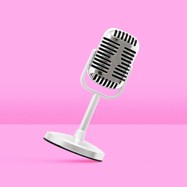 Foto grátis microfone eletrônico com fundo rosa