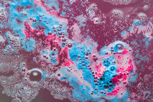 Foto grátis mistura de redemoinhos de espuma azul e fúcsia