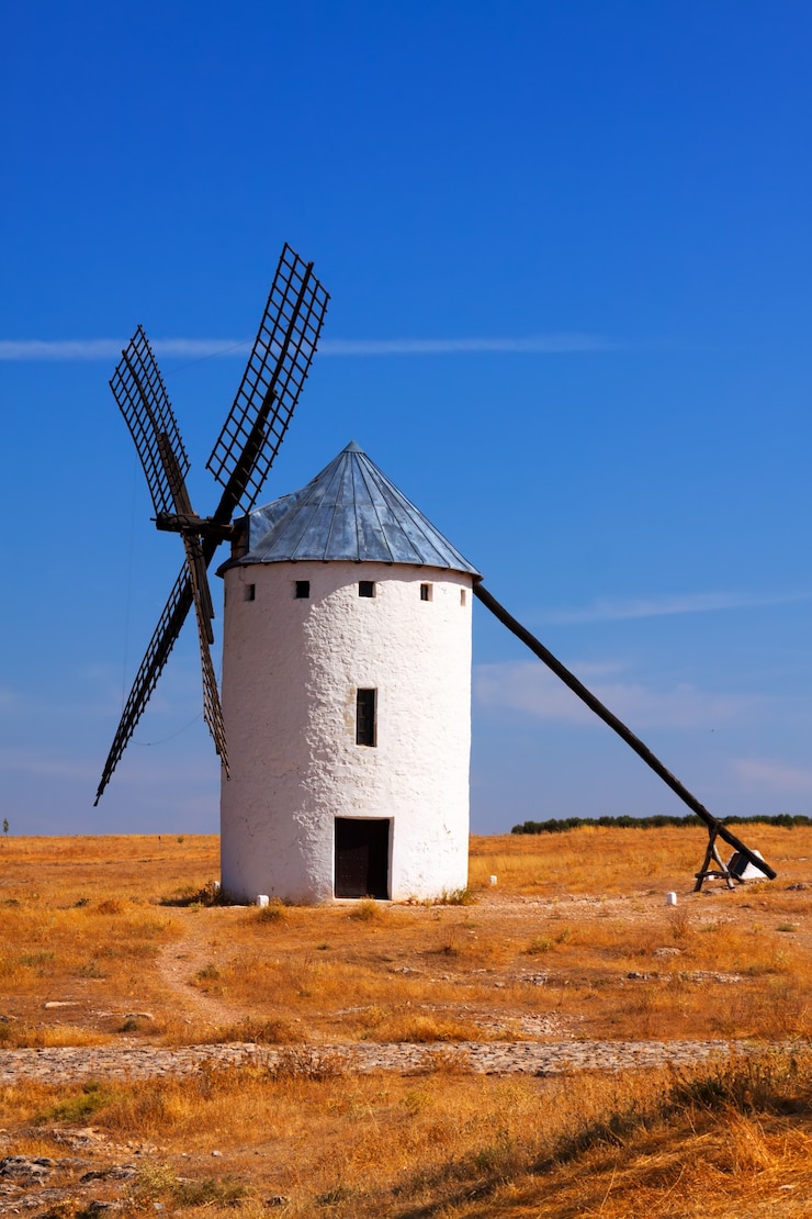 Foto grátis moinho de vento retro no campo