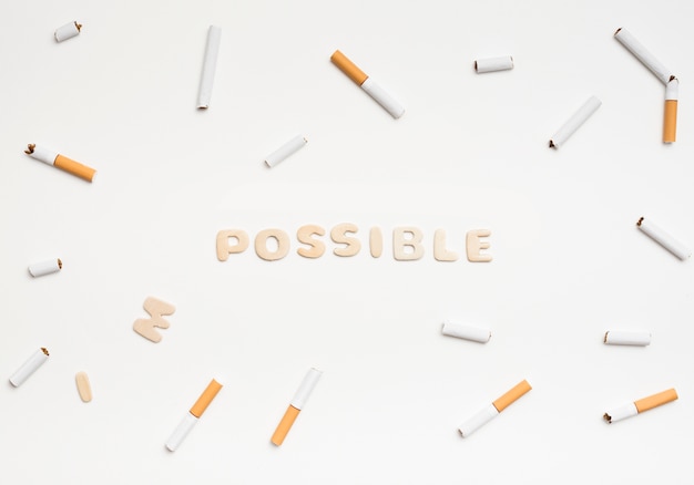 Foto grátis mudando a palavra impossível para possível para deixar de fumar conceito