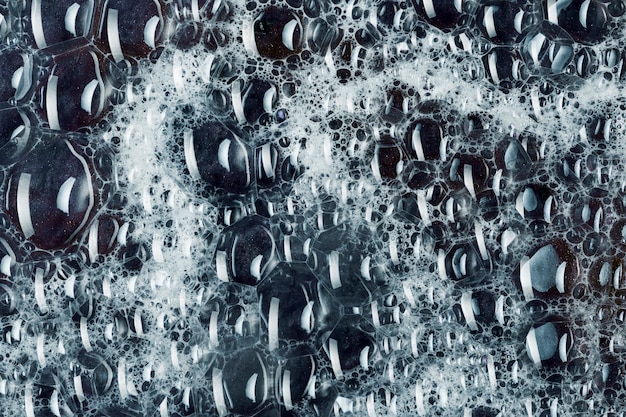 Foto grátis muitas bolhas no líquido preto