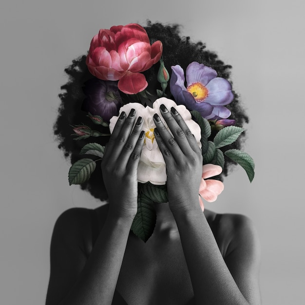 Foto grátis mulher afro-americana com flores postagem na mídia social do movimento blm