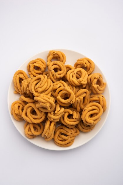 Murukku, também conhecido como chakli, lanche vegetariano tradicional do sul da Índia