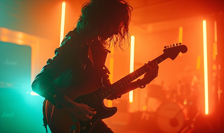 Foto grátis músico tocando guitarra elétrica