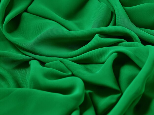 O pano abstrato verde, tecido e textura, teatro de cortina
