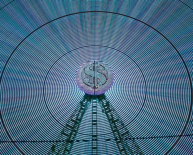 Foto grátis ondas abstratas da luz de néon da roda da maravilha