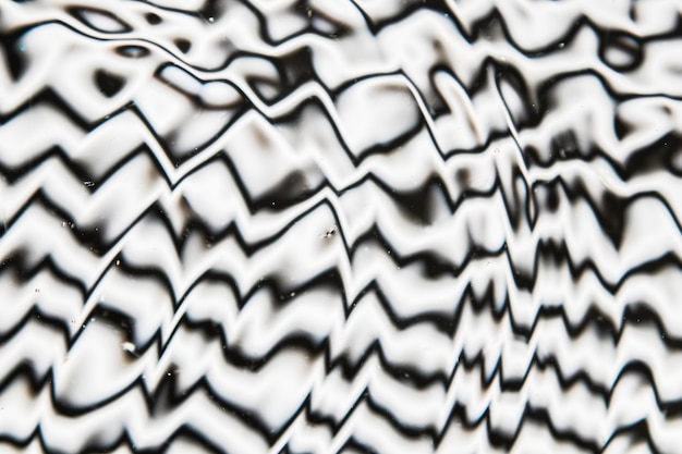 Foto grátis ondas de água em uma superfície de piscina preto e branco