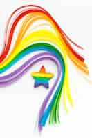 Foto grátis ondas de cores do arco-íris e estrela do orgulho