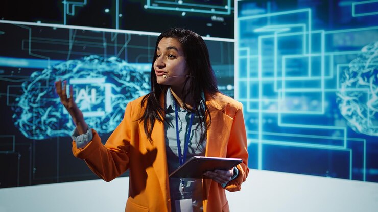 Foto grátis orador público fazendo apresentação em um evento de fórum tecnológico