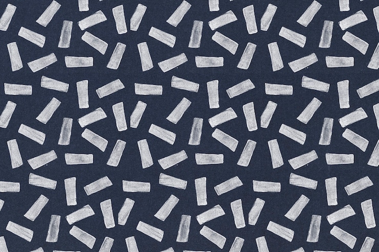 Foto grátis padrão estampado branco em estilo de impressão em bloco em fundo azul