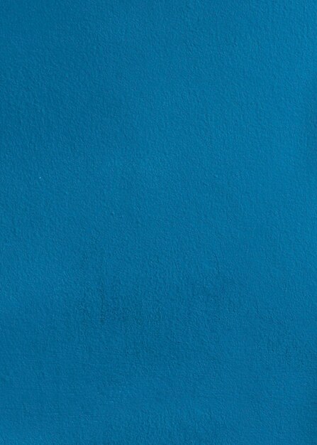 Pano de fundo texturizado de parede pintado de azul