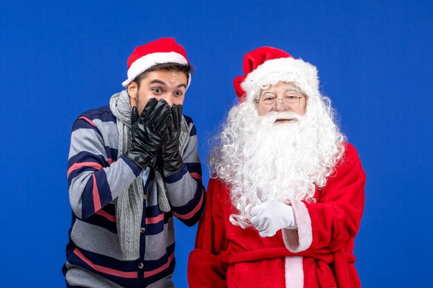 Foto grátis papai noel com jovem homem