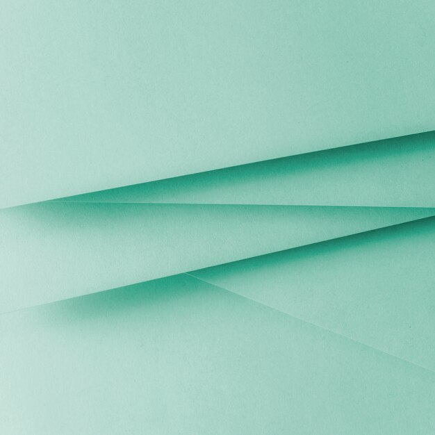 Papel de cor pastel plano geométrico fundo plano