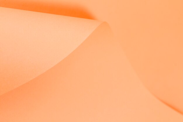 Papel enrolado textura de página laranja