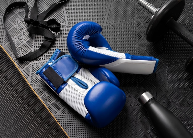 Foto grátis par de luvas para esporte de boxe