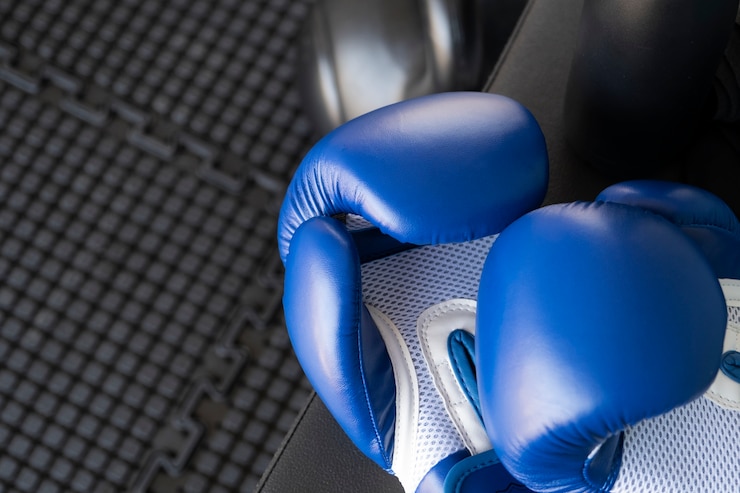 Foto grátis par de luvas para o desporto de boxe