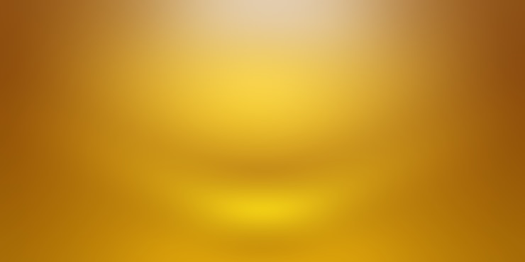 Foto grátis parede de estúdio gradiente de ouro amarelo abstrato de luxo, bem como uso como plano de fundo, layout, banner e apresentação do produto.