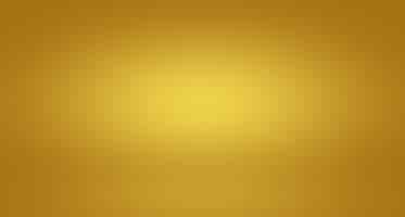 Foto grátis parede de estúdio gradiente de ouro amarelo de luxo abstrato bem usar como backgroundlayoutbanner e pres ...