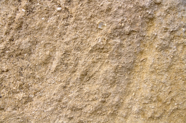 Foto grátis parede de pedra amarela