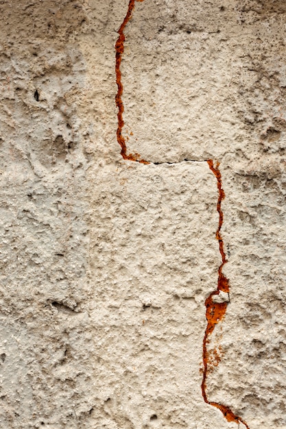 Foto grátis parede de superfície de concreto com rachadura