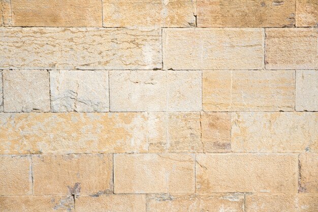 parede de tijolo obsoleta com rachaduras
