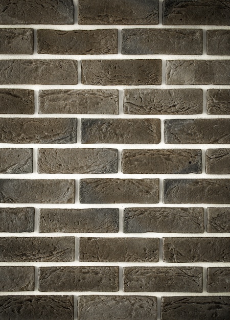 Parede de tijolos cinza claro, close-up criativo de back-phonon