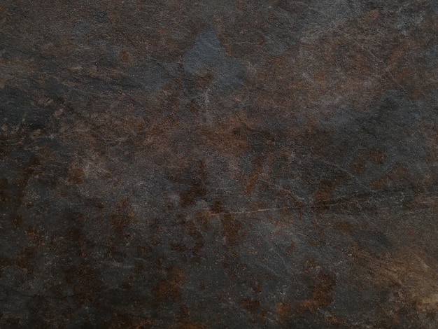 Pedra enferrujada marrom vazia ou textura da superfície de metal