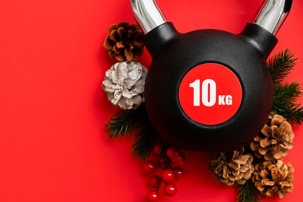 Foto grátis pesos de fitness de natal para presente de treinamento